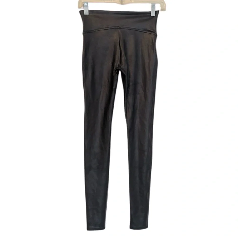 Spanx Women’s Black Faux Leather Leggings in a size Small.